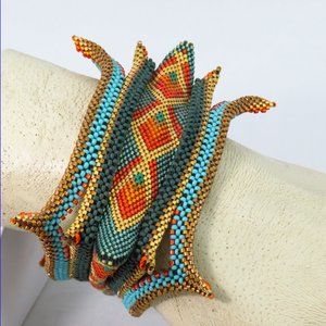 Triangular beaded Celtic bangle bracelet